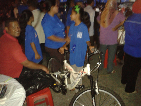 Lucky draw bicycle for a 13-year-old - the blue t-shirt was the price of admission